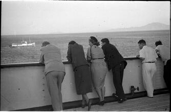 [Felicia Marsh with other people on deck of ship.]
