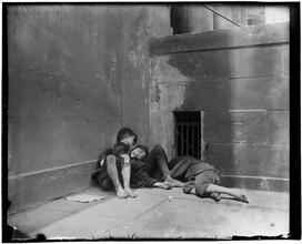Street Arabs in sleeping quarters.