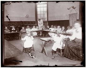 In one of the uptown schools of the New York Kindergarten Association