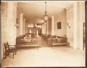 [Interior, office space and waiting area.]