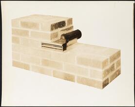 [Brick wall cut-away with embedded drainage pipe.]
