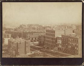 [View from the roof of George Ehret's home at Park Avenue and 94th Street.] Looking southeast, showing 93rd Street and Lexington Avenue. The litte frame house on 93rd between Park and Lexington Avenue