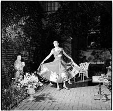 Beaux Arts Ball [Woman in a courtyard at a costume party for members of the Architectural League of New York.]