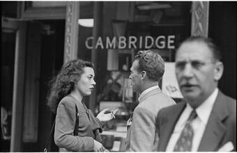 Street Conversations [Man and woman talking on the street.]