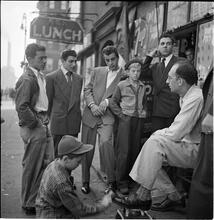 Shoe Shine Boy [Mickey shining shoes.]