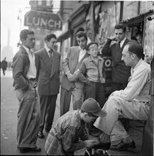 Shoe Shine Boy [Mickey shining shoes.]