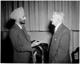 Dale Carnegie [Dale Carnegie speaking with S. S. Jaaj, a student.]